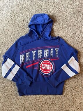 Junk Food Detroit Pistons Blue Crop Hoodie with White Sleeve Stripes